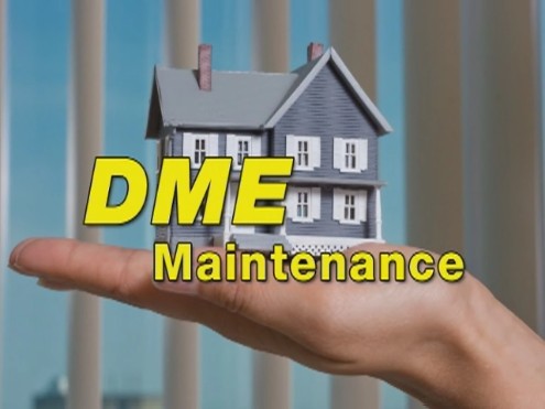 Professional chimney cleaning technician working on roof in Lindenhurst, NY