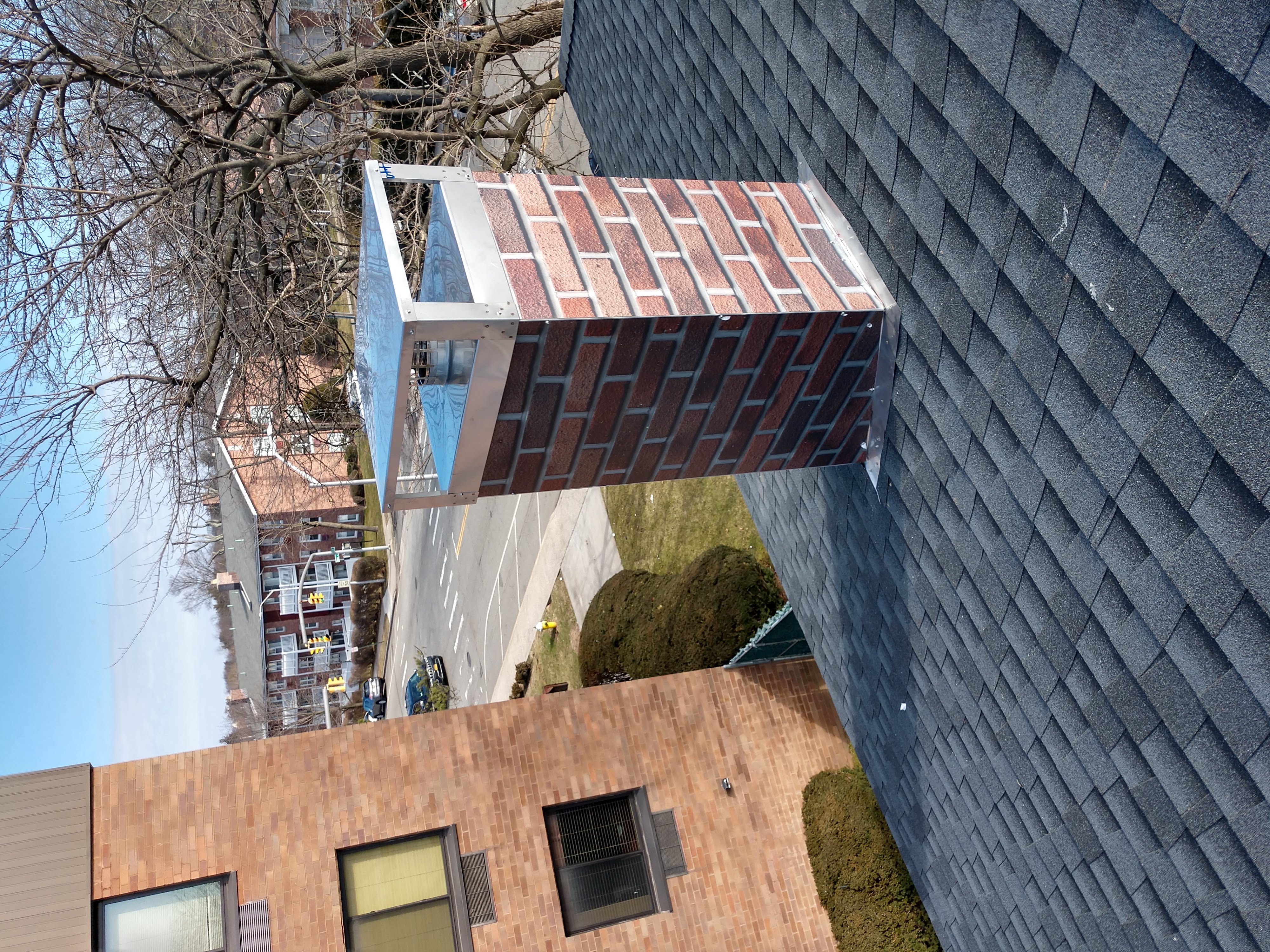 New elastomeric sealant applied to chimney crown in Lindenhurst, NY